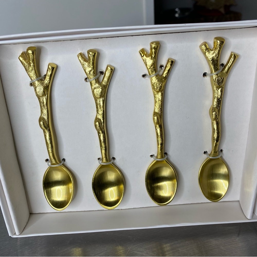 Set of 4 gold tea spoons